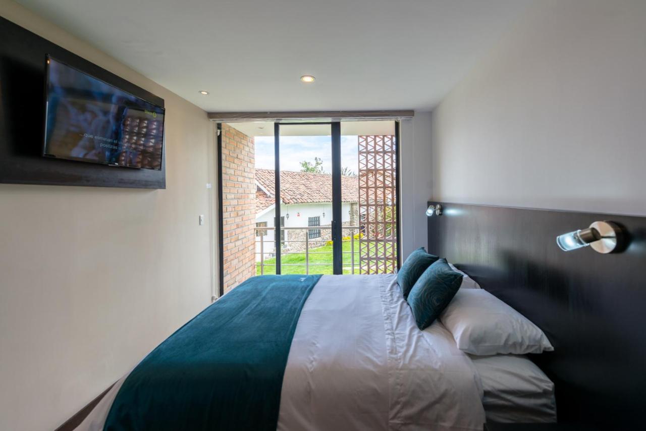 Venue Batan Hotel&Suites Cuenca Esterno foto